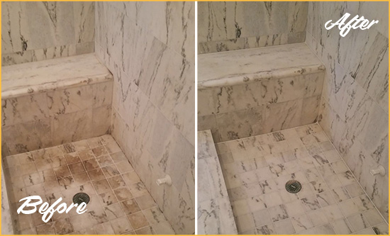 Before and After Picture of a Dirty Scituate Marble Shower Cleaned to Eliminate Dark Stains