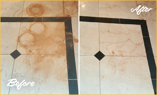 Before and After Picture of a Chelmsford Hard Surface Restoration Service on a Marble Floor to Eliminate Rust Stains